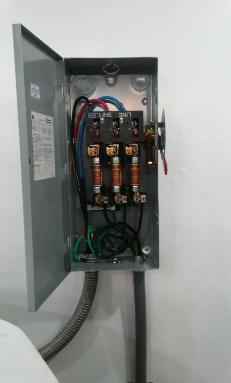Three-phase disconnect switch installed for Smoke Detector Installation in Baker